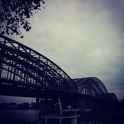 View of bridge against cloudy sky