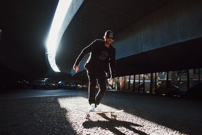 Man standing on skateboard