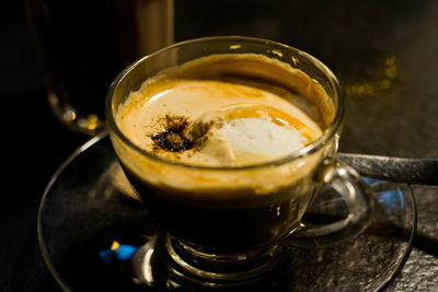 Close-up of tea in glass on table