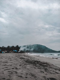 Scenic view of beach against sky