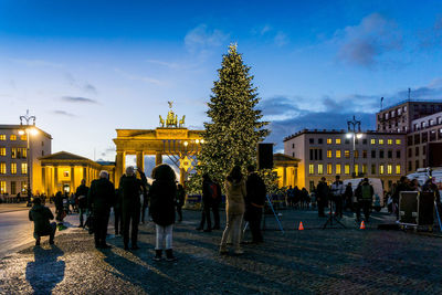 Christmas celebration at brandenburg gate during sunset