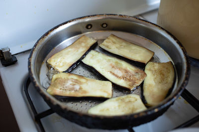 High angle view of meat in cooking pan