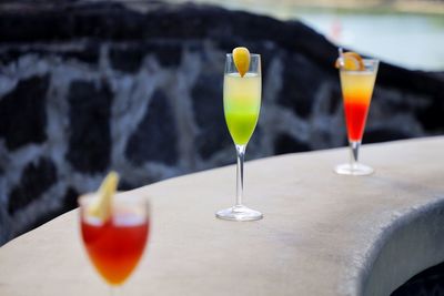 Close-up of cocktail on a pool bar 