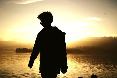 Silhouette of people at sunset