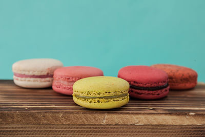 Close-up of multi colored candies on table