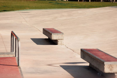 Empty skatepark, skateboarding park in city on sunny day