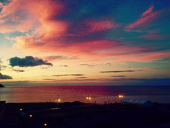 Scenic view of sea against cloudy sky