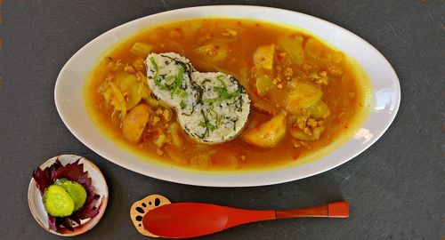 Directly above shot of soup served on table