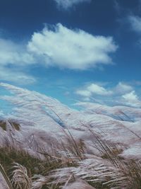 Scenic view of snow covered mountains against sky