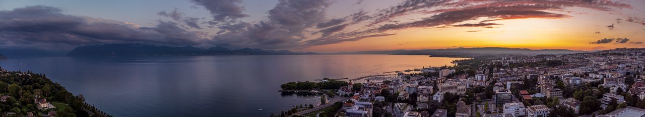 High angle view of city at sunset