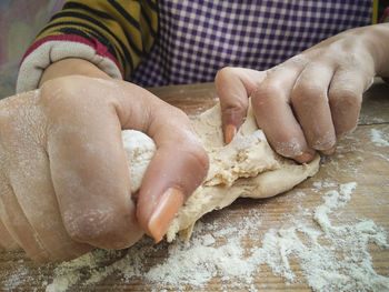 Close-up of woman preparing food