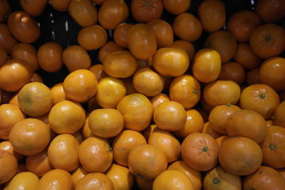 Full frame shot of oranges in market