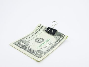 Close-up of coins on white background