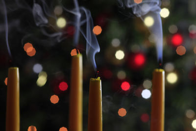 Close-up of illuminated christmas lights at night