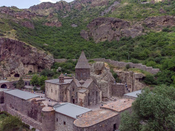 Geghard monastery complex in armenian mountains