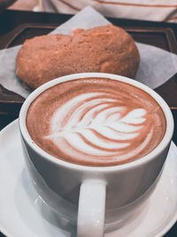 Close-up of cappuccino on table