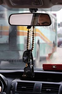 Sunglasses hanging in car