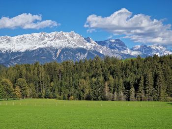 Scenic view of snowcapped mountains against sky