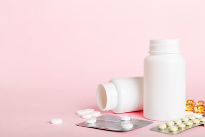 Close-up of medicines on white background