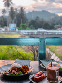 Close-up of breakfast served on table