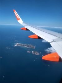 Airplane flying in sky