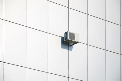 Close-up of security camera on wall