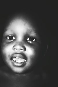 Close-up portrait of smiling girl