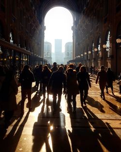 Group of people in front of buildings