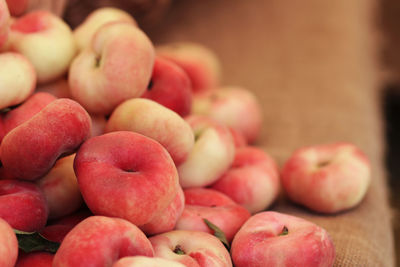 Saturn peaches for sale at market stall