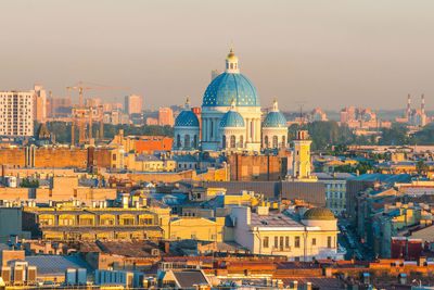 View of buildings in city against sky