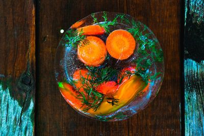 High angle view of fruits in bowl on table