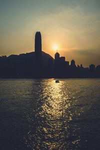 Silhouette of buildings at sunset