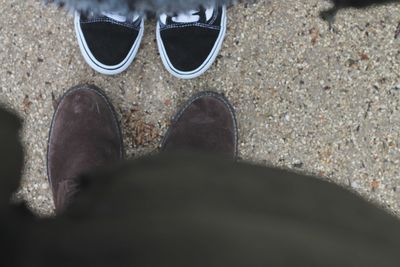 Low section of man standing on floor