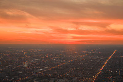 Aerial view of cityscape at sunset