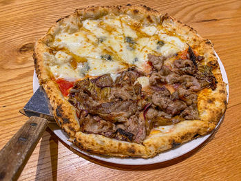 High angle view of pizza on table