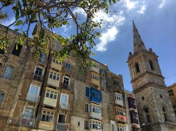 Coloured palaces and bell tower in malta 