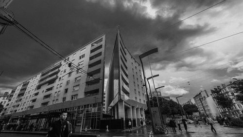 Low angle view of buildings against sky in city