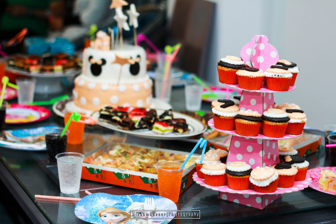 food and drink, cake, table, still life, sweet food, food, dessert, sweet, focus on foreground, baked, indulgence, choice, close-up, celebration, indoors, unhealthy eating, no people, selective focus, for sale, freshness, temptation, retail display