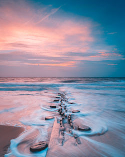 Scenic view of sea against sky during sunset