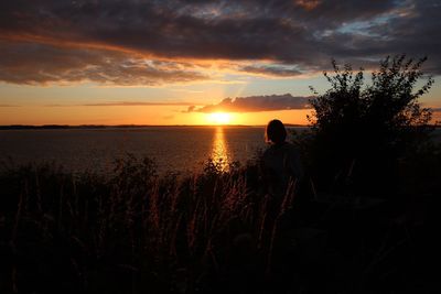 Scenic view of sunset over sea