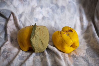 Close-up of yellow fruits on table