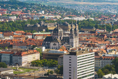 The stift haug church in würzburg surrounded by the city
