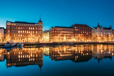 Reflection of buildings in river