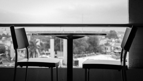 Empty chairs and table in restaurant