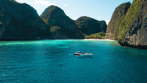 Scenic view of sea against mountain