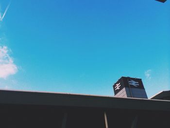 Low angle view of built structure against blue sky