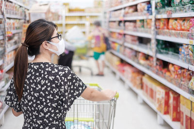 Woman standing in store