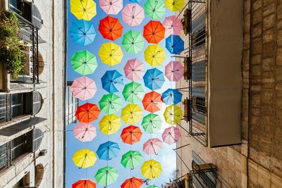 Low angle view of colorful umbrellas