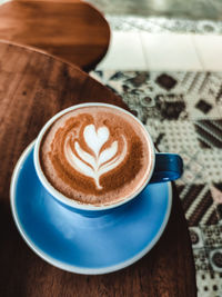 Close-up of cappuccino on table