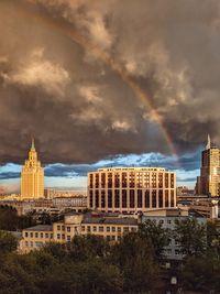 Rainbow over hotel leningradskaya known as hilton, at the left